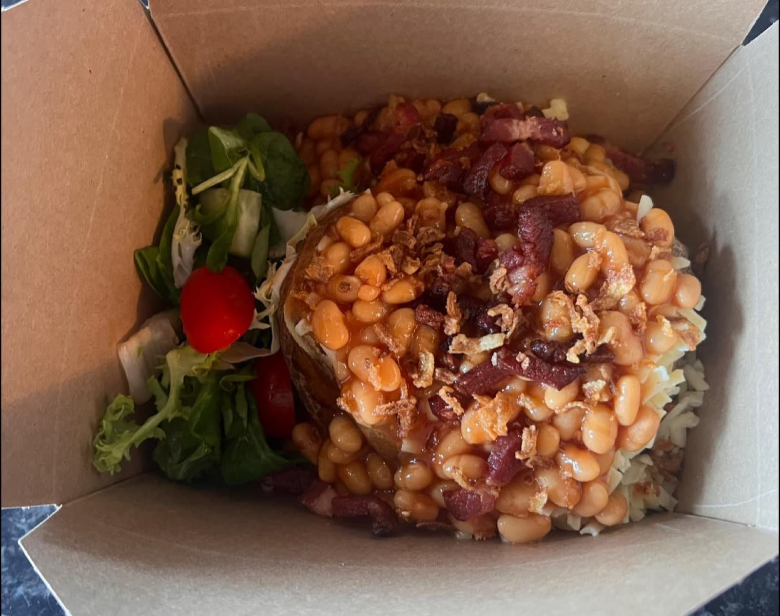 The Classic Jack — Butter, cheddar, baked beans, crispy bacon, chives.